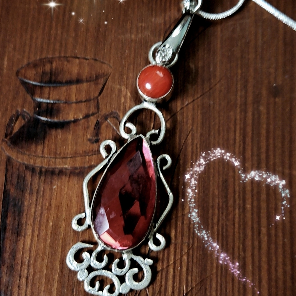 Elegant Red Faceted Pendant/Beautiful Scroll Detail Around Bezel.Has A 24"Chain